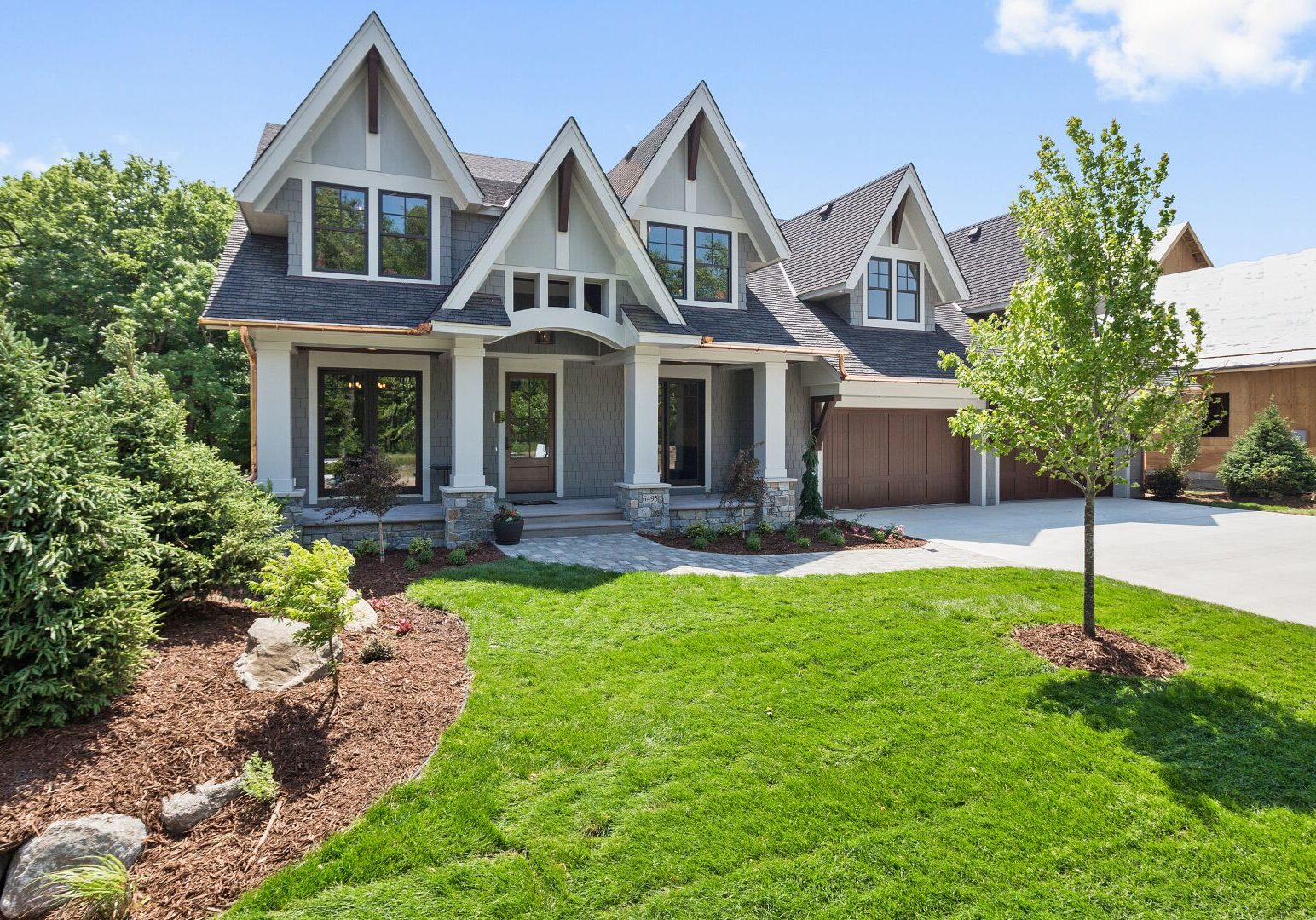 Craftsman home with immaculate landscaping Craftsman home with immaculate landscaping